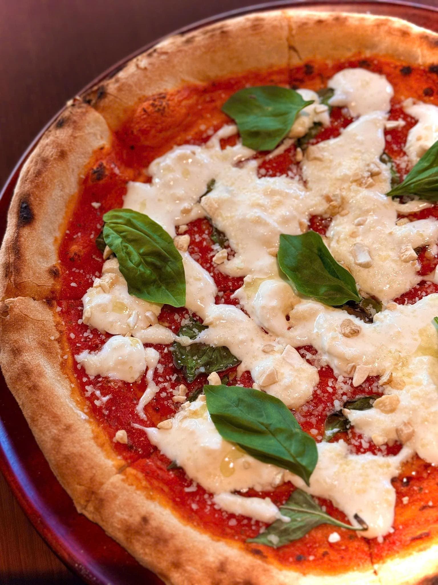 Stracciatella-topped dish served at Ovenista